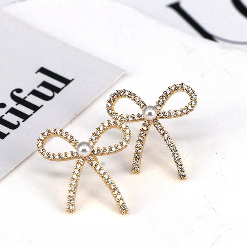 1 Pair Elegant Lady Bow Knot Inlay Copper Artificial Pearls Imitation Pearl Zircon 18K Gold Plated Ear Cuffs Ear Studs